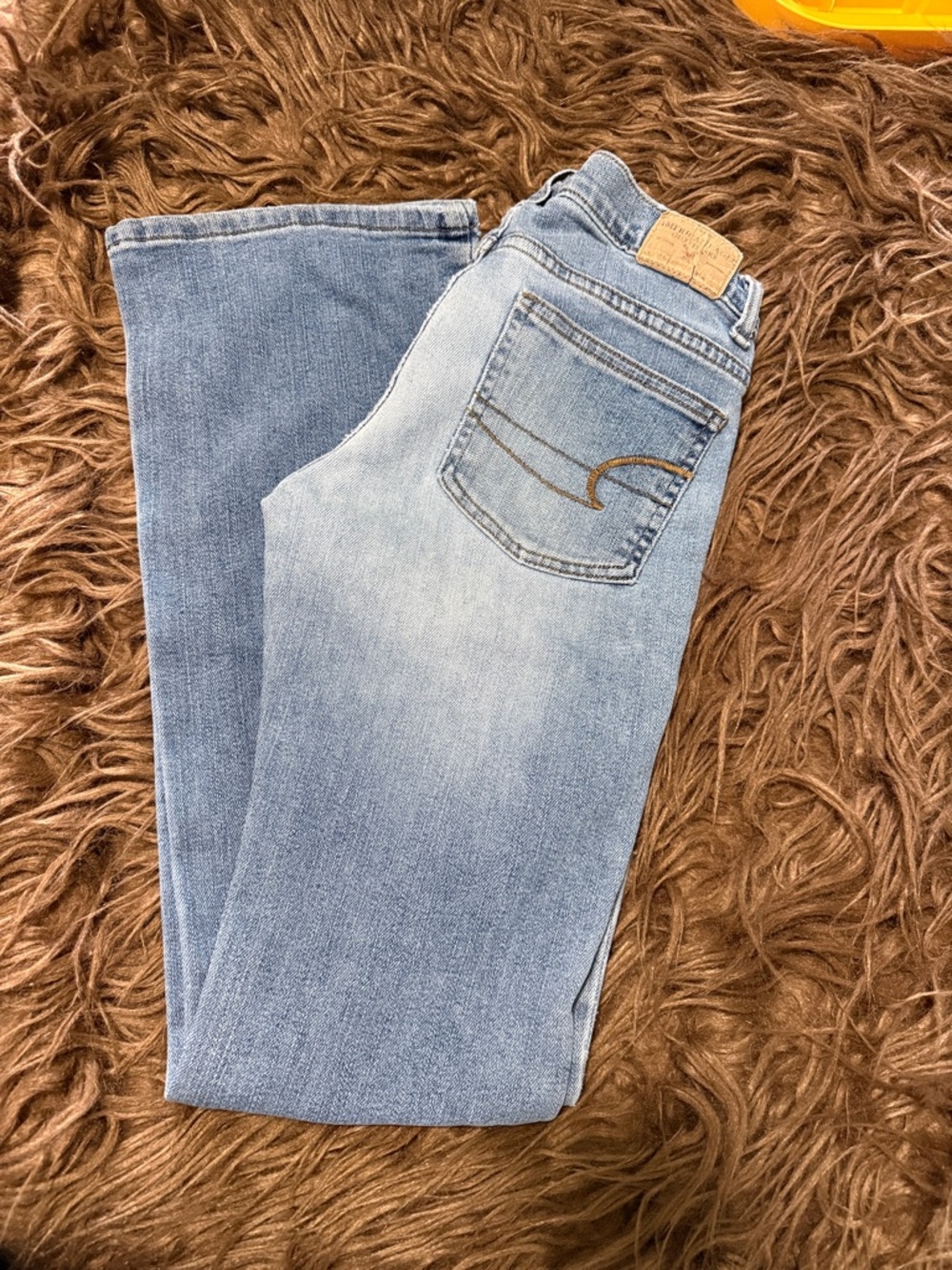 Light Wash Denim Jeans with Subtle Back Pocket on Stitch